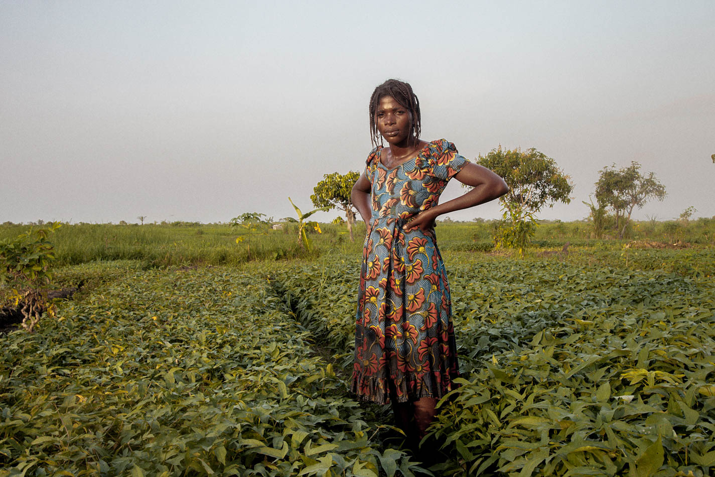 A woman standing in a field