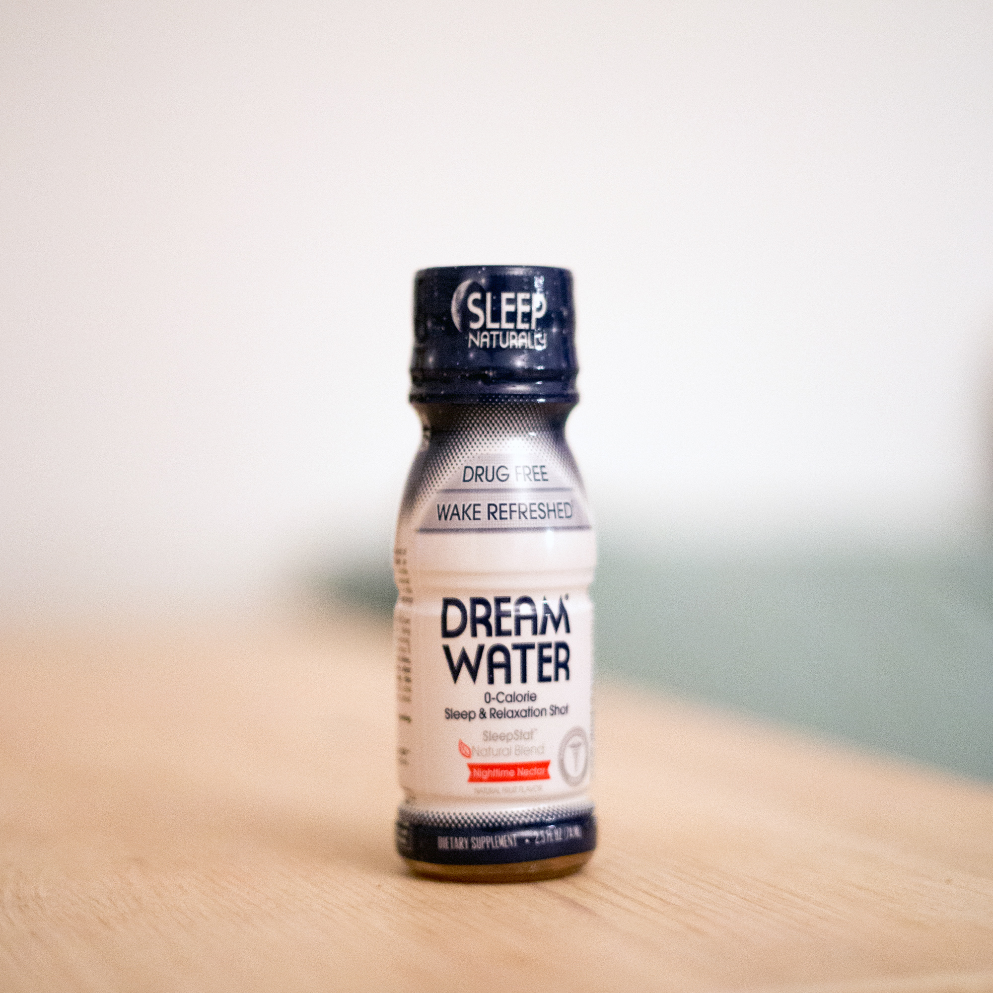 A bottle of Dream Water on a table