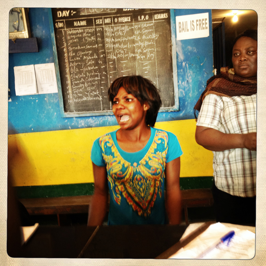 A woman in a police station