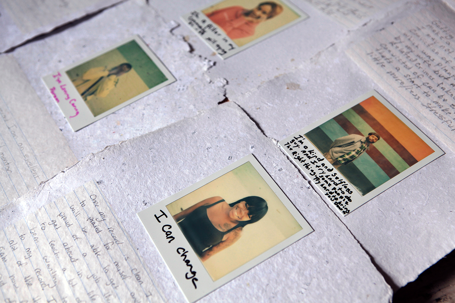 Polaroid photographs and handwriting on paper