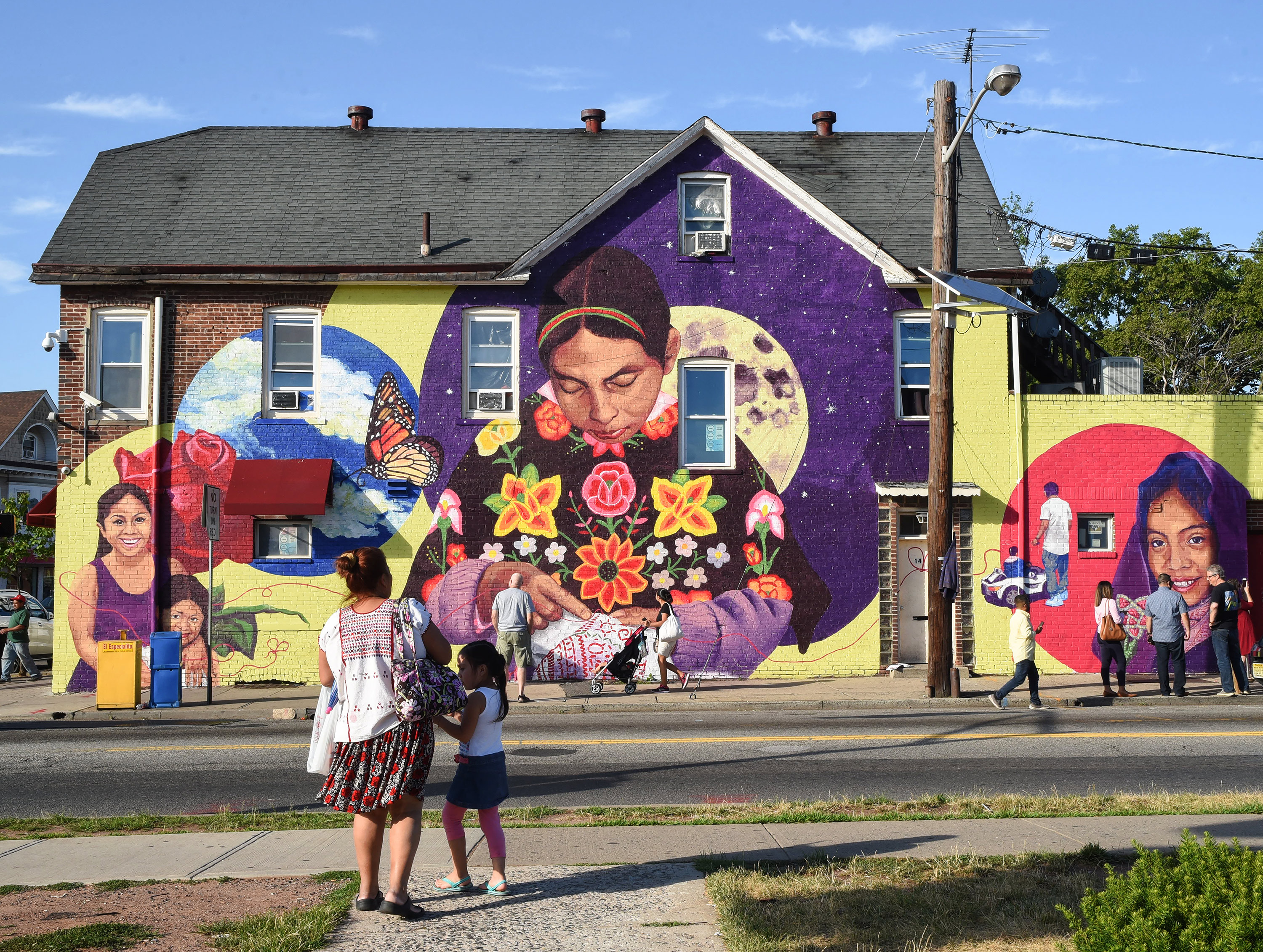 A mural painted on the side of a house