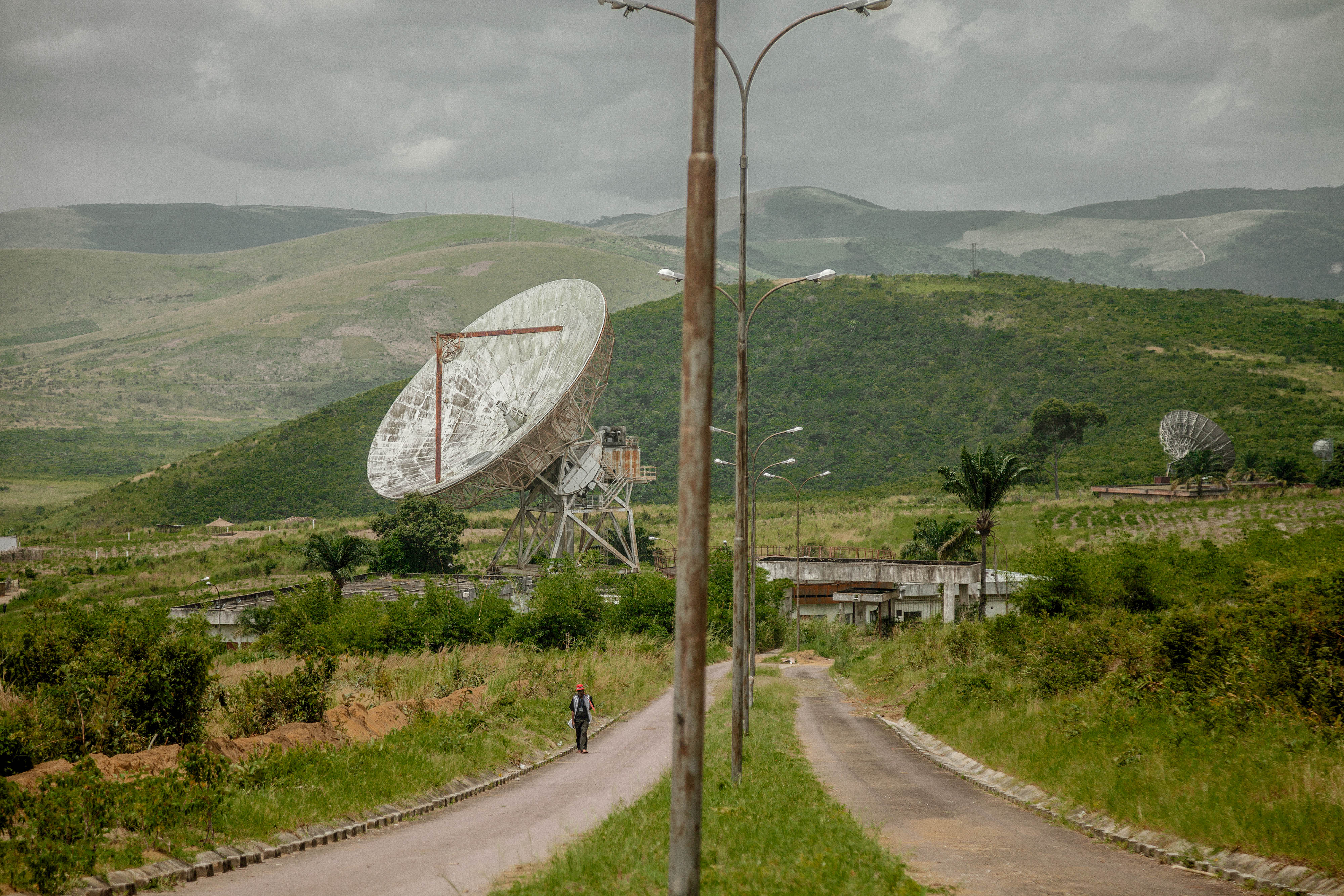 Aging satellite dishes in a landscape
