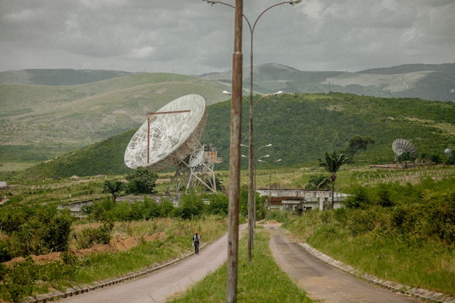 Aging satellite dishes in a landscape
