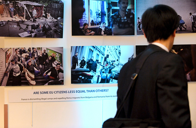 Man looking at At Home in Europe Project exhibition