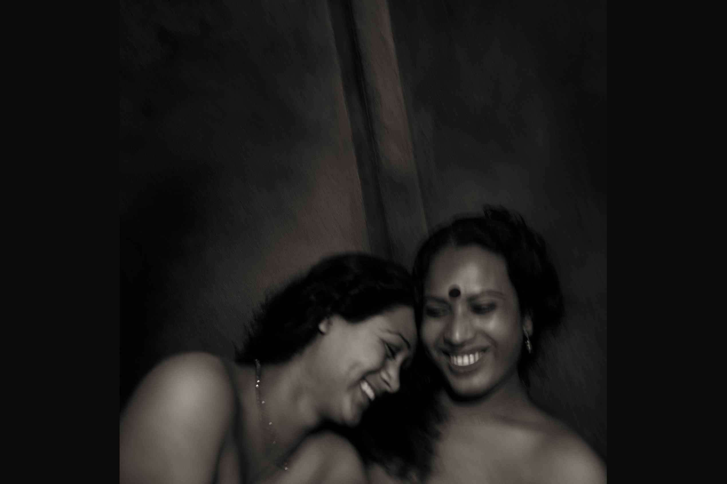 Two women laughing