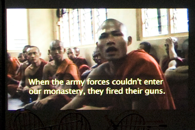 Monks sitting in a room