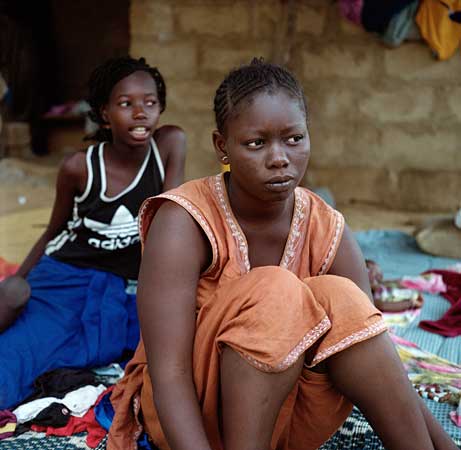 Two girls sitting on the floor
