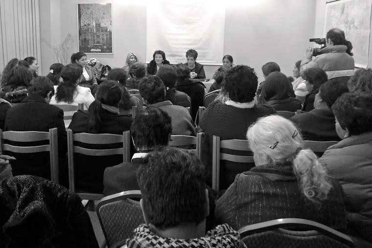 Women gathered for a panel discussion