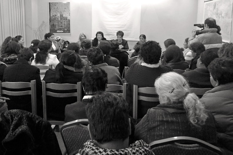 Women from four Albanian cities meet to discuss their advocacy work as part of what would become the Roma and Egyptian Women Network. The group’s mission is to coordinate actions aimed at improving the socioeconomic and political situation of Roma and Egyptian women in Albania. Photo credit: Albi Veizi/Roma and Egyptian Women Network Women gathered for a panel discussion