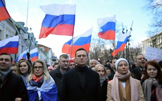 Alexei Navalny and other demonstrators march in Moscow.
