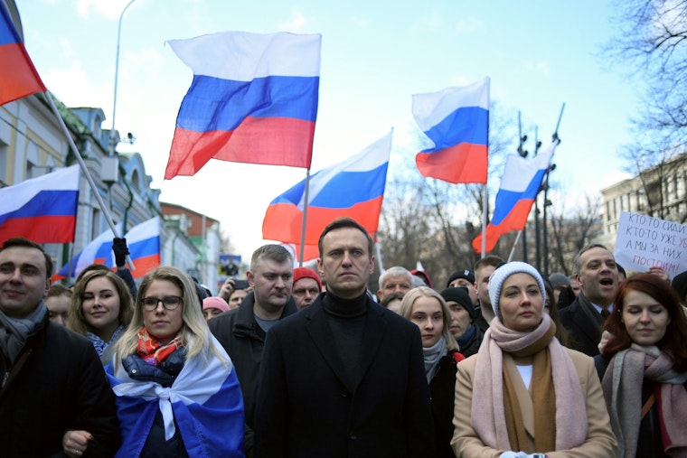 Alexei Navalny and other demonstrators march in Moscow.