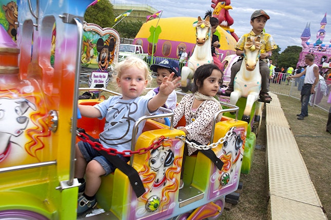 Children on an amusement park ride
