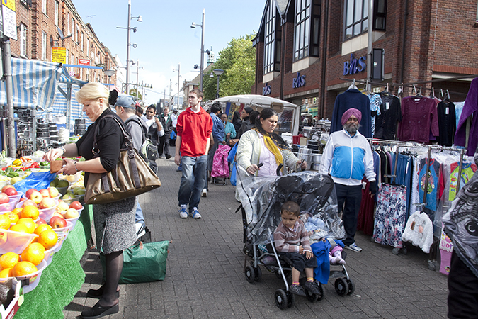 A woman pushing a stroller