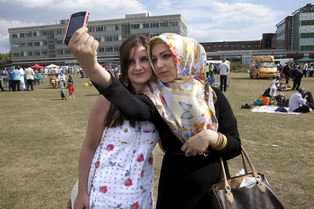 Two girls taking a photo together