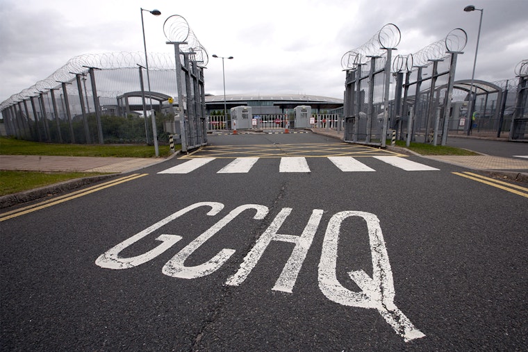 The Government Communications Headquarters (GCHQ) are located in Cheltenham, Gloucestershire. Photo credit: © John Harris/Report Digital-REA/Redux Road with fence