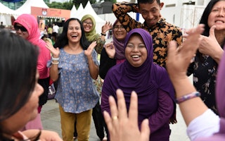 A group of people celebrating together