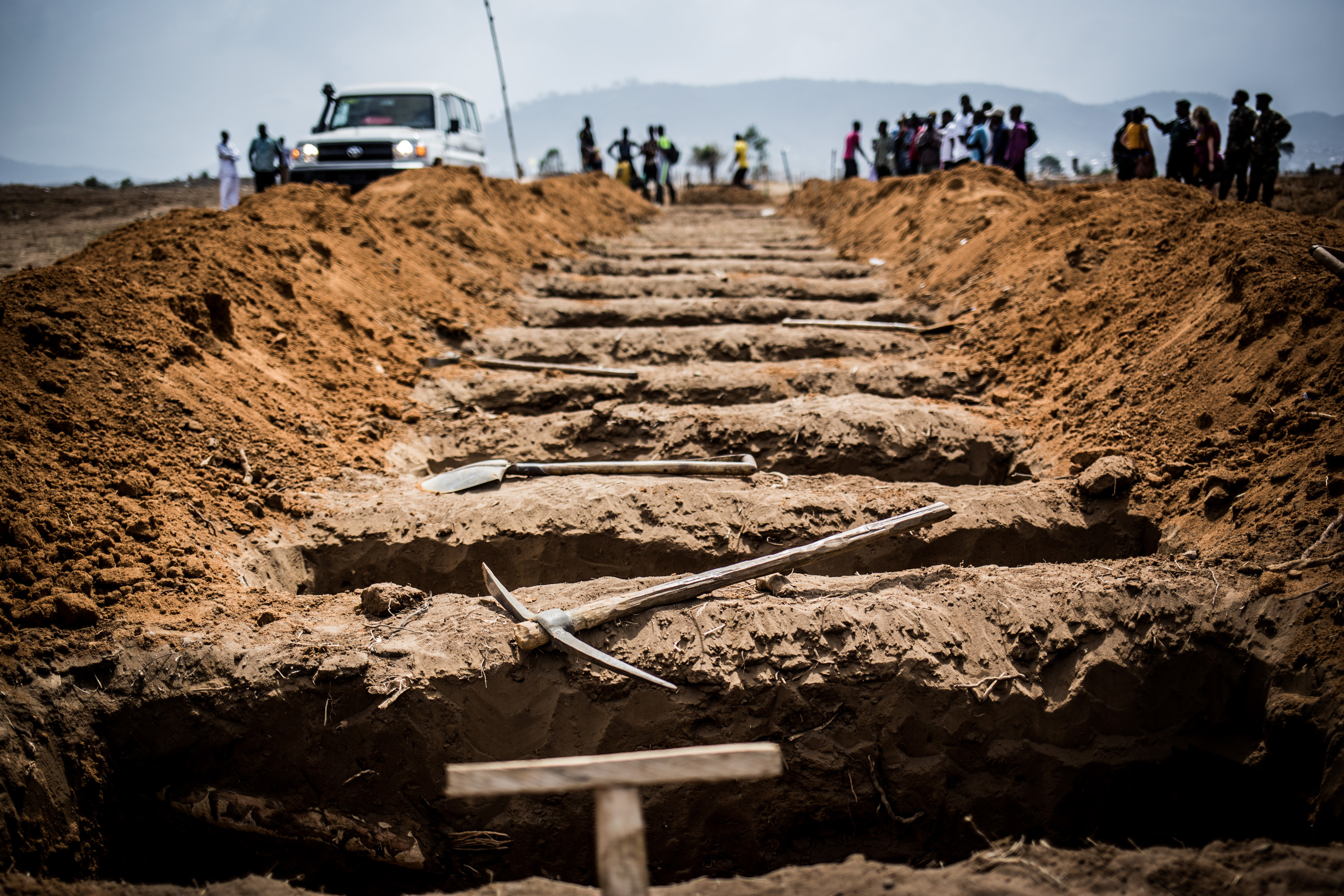 Rows of newly dug graves