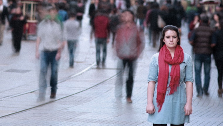 Woman standing on a street