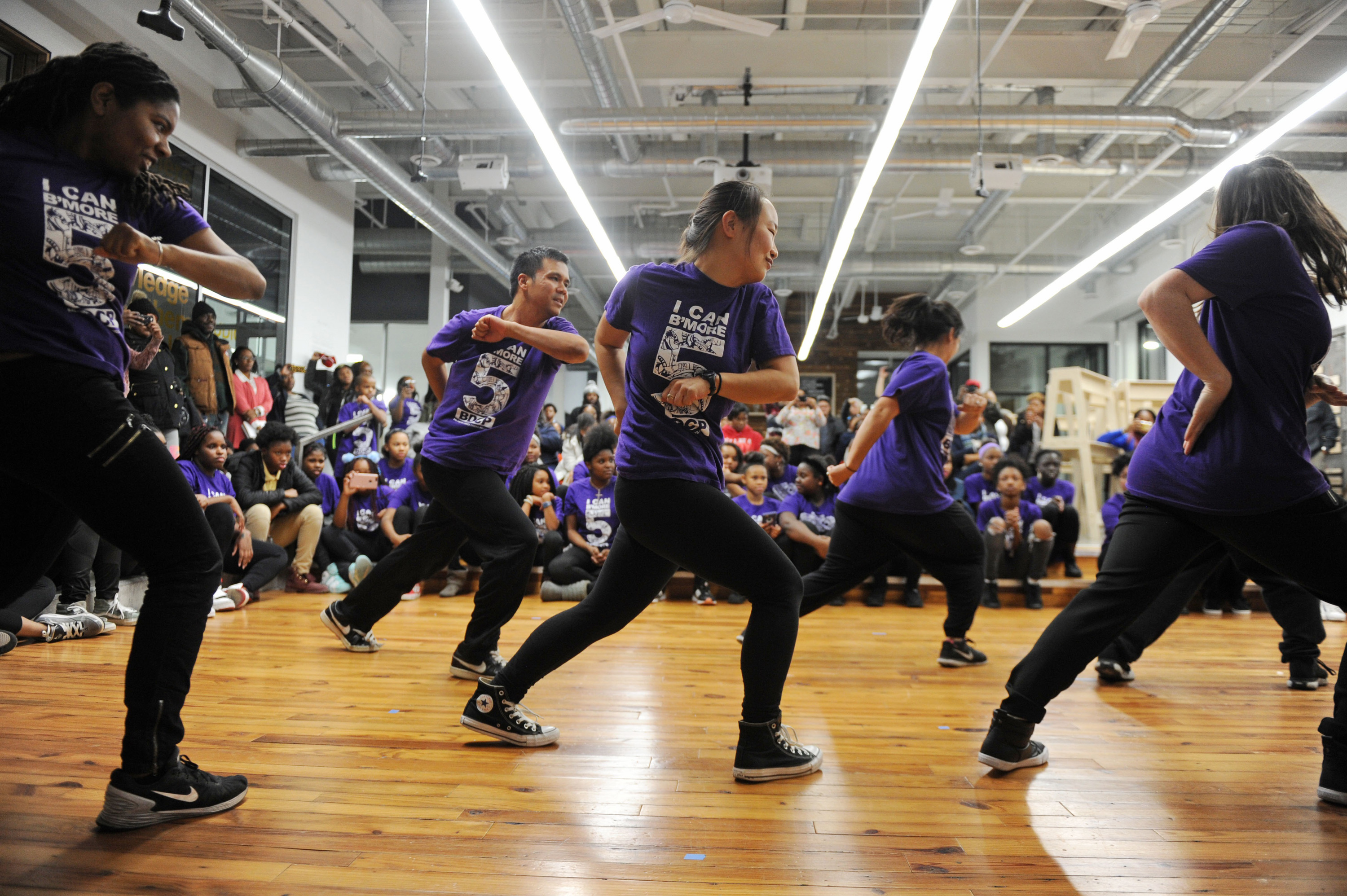 Students perform a hip-hop dance routine.