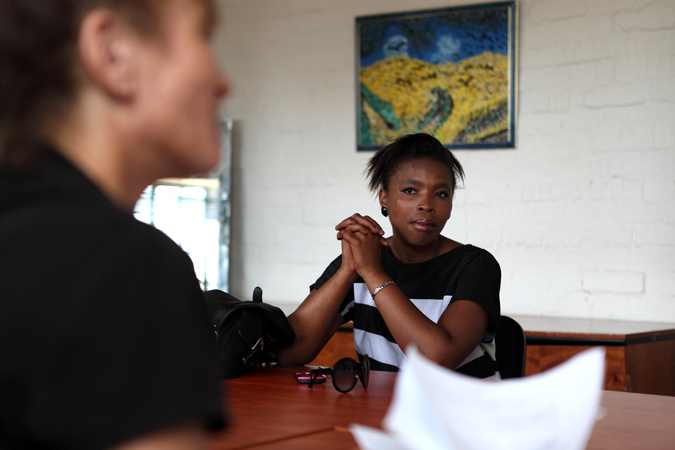 A woman sitting at a desk