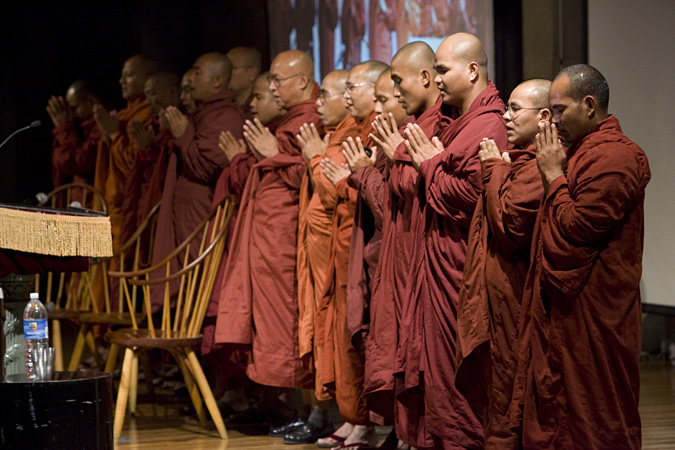 Row of monks praying