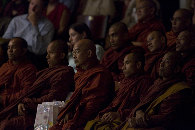Monks sitting in an audience