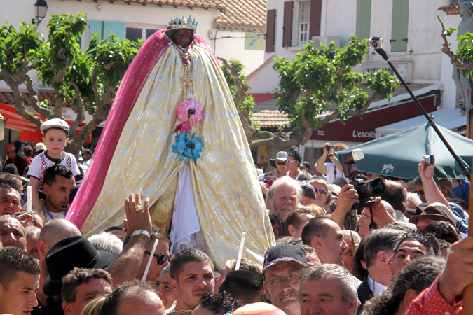 A procession of a statue