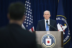 John Brennan at a podium