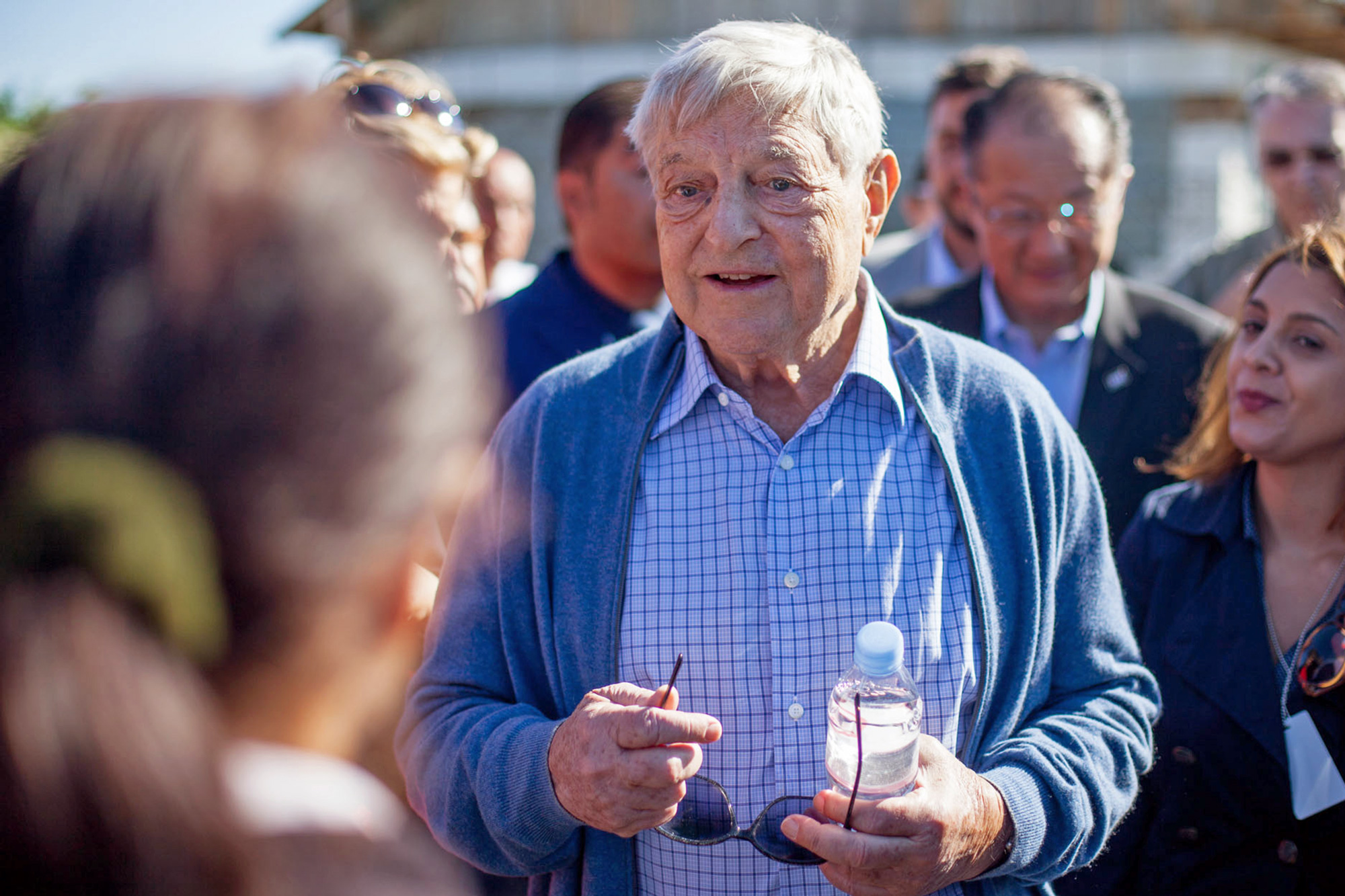 Man speaking amid crowd