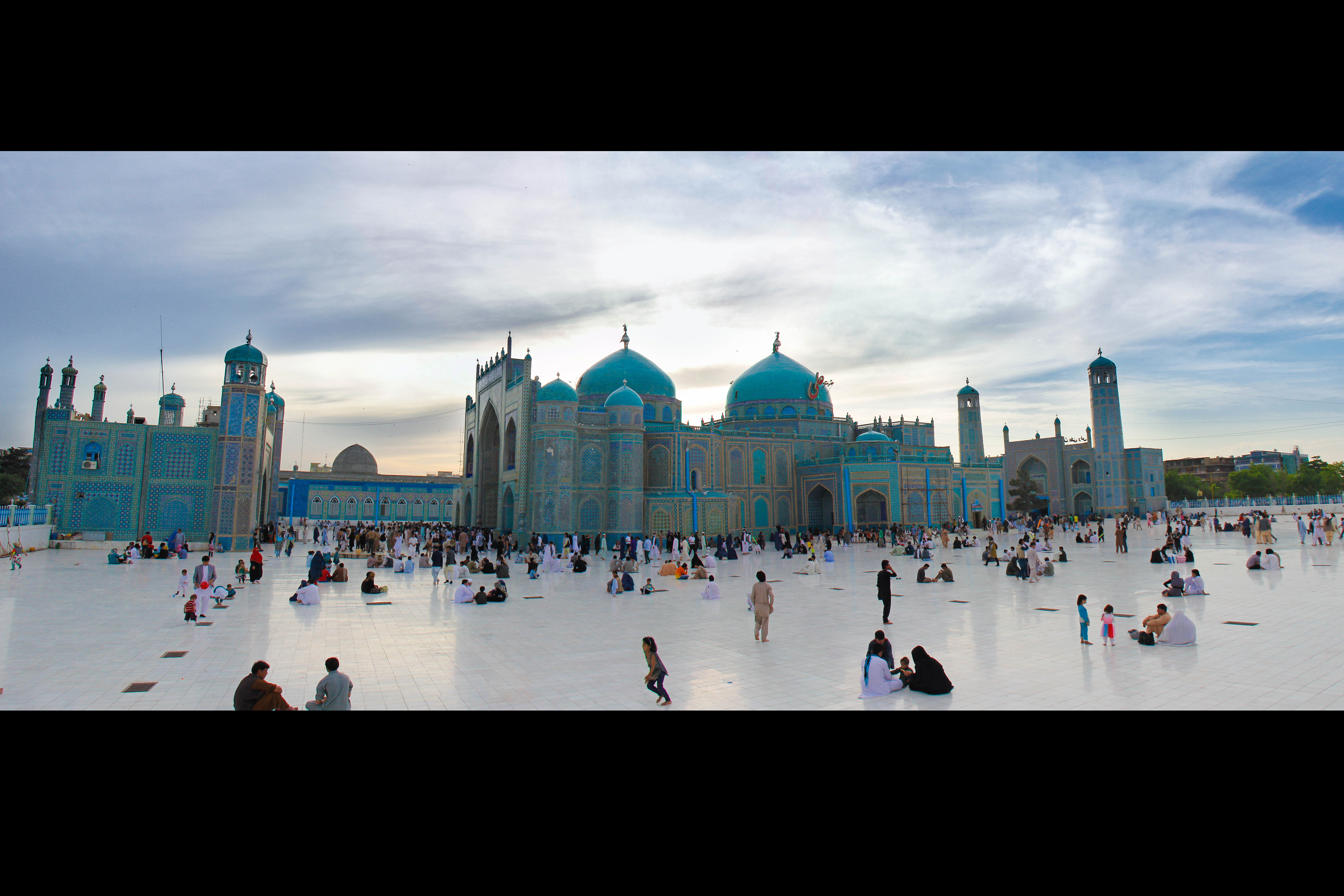 Families on the grounds of a mosque