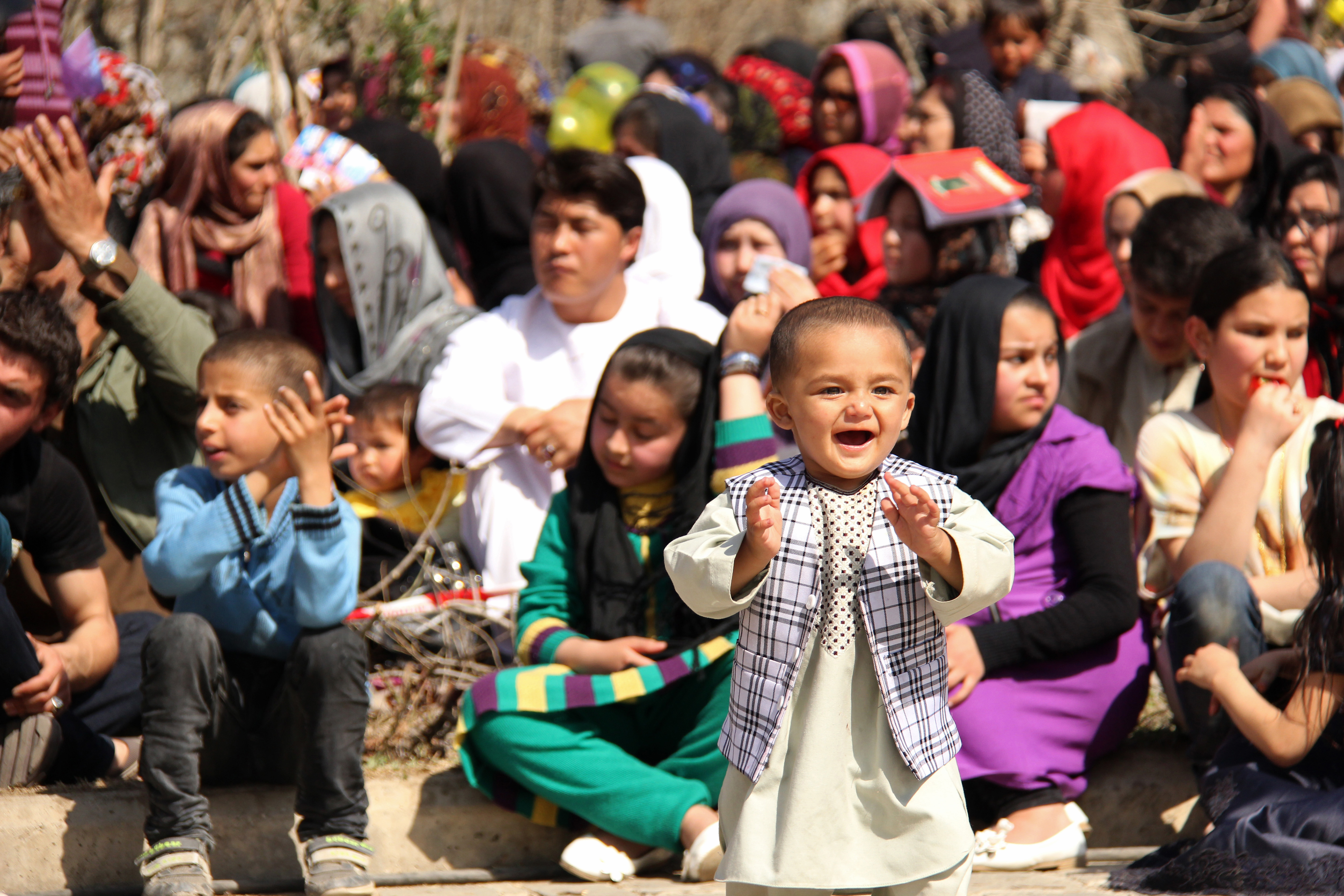 Families at an outdoor concert