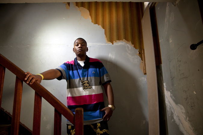 A young man in a stairwell