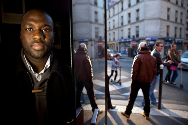 Adji Ahoudian, local council official in Paris. Adji contrasts the excitement he felt when he first received the card that identified him as an elected official with the disillusionment of being singled out for an identity check. “You think to yourself, ‘Ho la la, this card is a sign of my full belonging to the French Republic.’ And then ‘poof,’ when that moment comes of an identity check, a familiar memory immediately rises to the surface. You realize that while you belong to the Republic and you live in the Republic, you aren’t actually a full citizen. You are a second-class citizen. You are continually reminded that due to your face, due to your skin color, due to your appearance that you are not really from here—even when you are an elected official of the Republic.” Photo credit: © Ed Kashi/VII for the Open Society Foundations Man