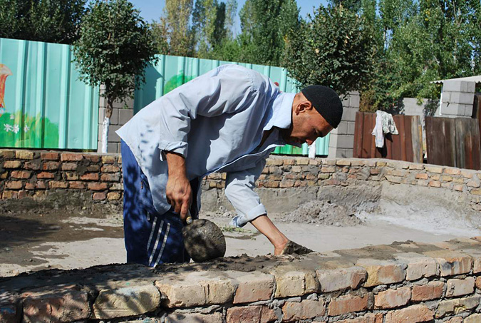 Man restores brick swimming pool