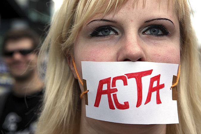 An activist demonstrates against the Anti-Counterfeiting Trade Agreement on June 9, 2012, in Berlin, Germany. Photo credit: © Adam Berry/Getty Images An activist demonstrating against the ACTA