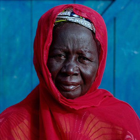 Woman in red headscarf