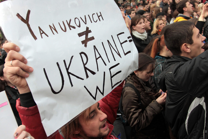 A protestor holding a sign