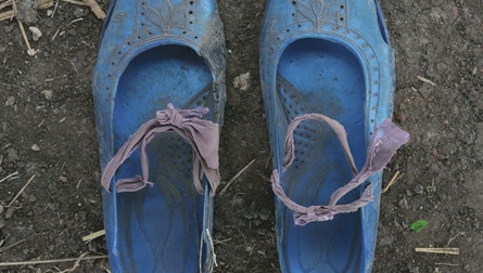 A pair of worn shoes