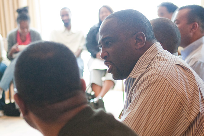 Shawn Dove sitting among group of people