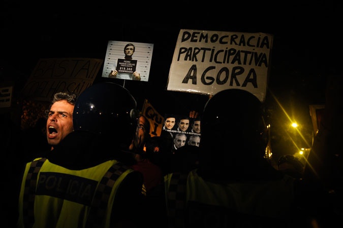 Man shouting at protest in Portugal.