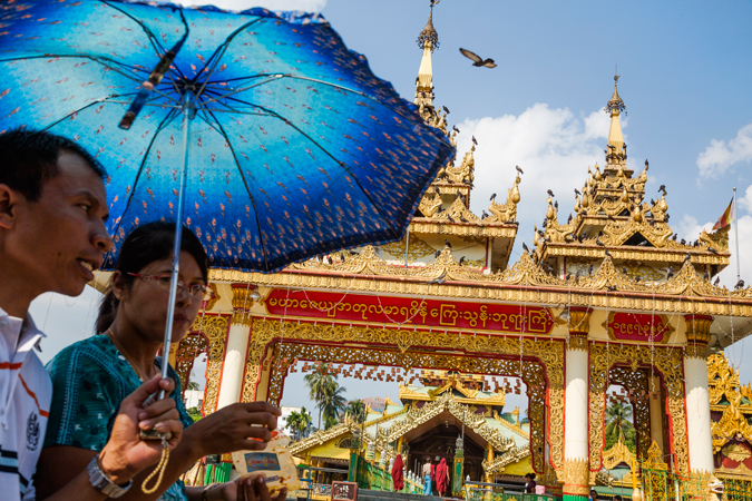 Woman walking with umbrella