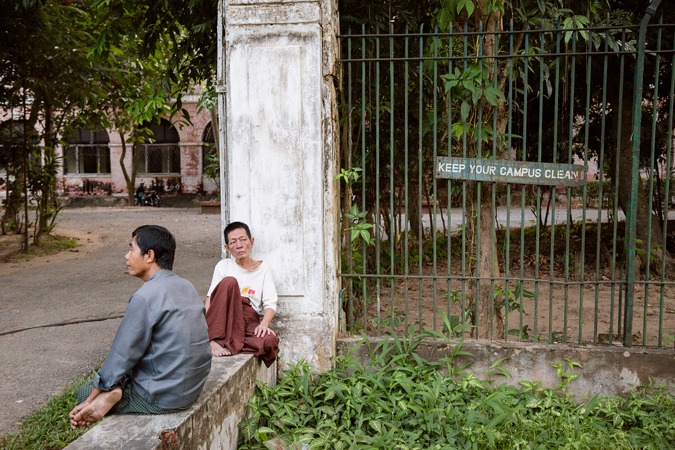 Men sitting on wall
