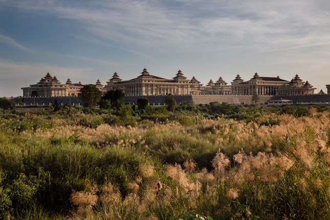 The grandiose seat of the People’s Parliament, the first one in five decades, in the new capital city of Naypyitaw, Burma on December 15, 2012. The Parliament is based on Burma’s 2008 constitution, which was drafted by the military regime and which gives 25 percent of the seats to military representatives. Despite the undemocratic nature of its inception, Burma’s Parliament has been a source of some reform over the last two years. In a historic by-election in 2012, Daw Aung San Suu Kyi became a Member of Parliament, a little over one year after her release from house arrest in late 2010. Photo credit: © Ed Kashi/VII for the Open Society Foundations buildings in Naypyitaw