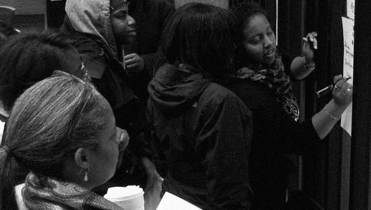 Still image from “UN Sustainable Development Goals: The Power of Participatory Democracy.” The Sustainable Development Goals are a lever for civil society to push their democracies to be more accountable, to be more inclusive, to be more open. But these global compacts must be put to use. Citizens rally at a building entrance