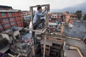 A man on a scaffolding