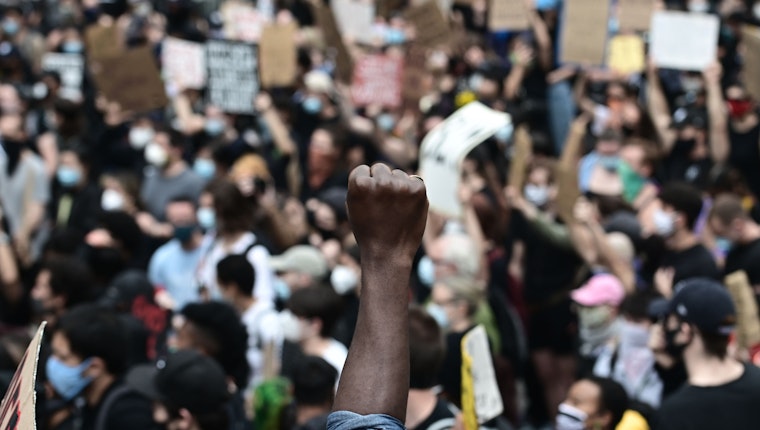 A group of people engage in public protest