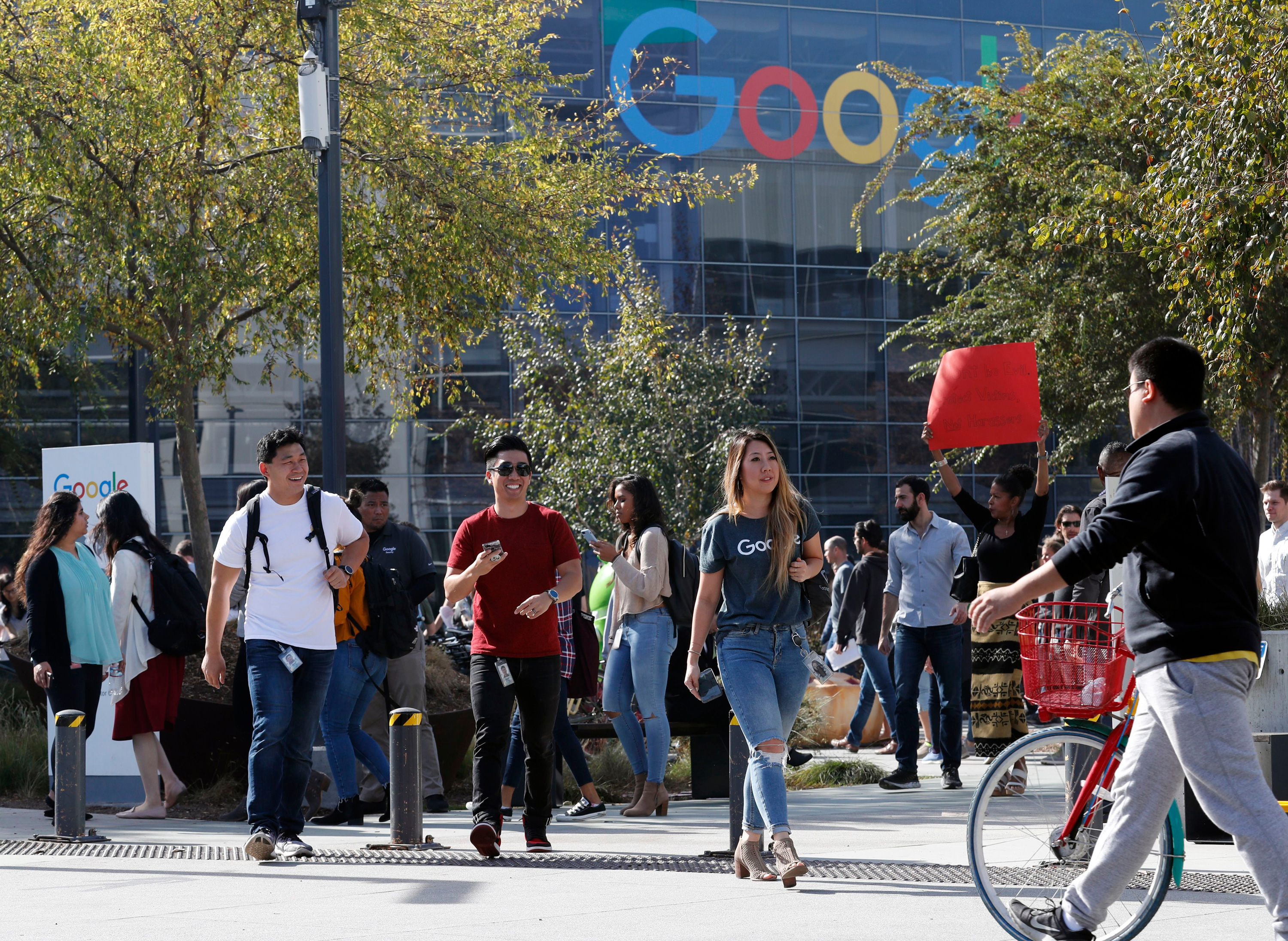 People walking outside of a Google building