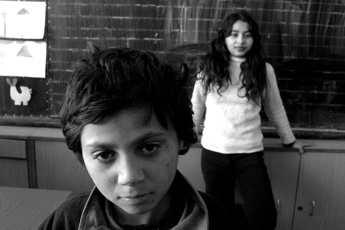 While Europe deliberates over what needs to be done for Roma education, days, months and years simply slip by in the lives of hundreds of thousands of Roma children. “Students during Class” by Anush Babajanyan, Obshtina, Bulgaria (2005) Photo credit: © Anush Babajanyan Two school children
