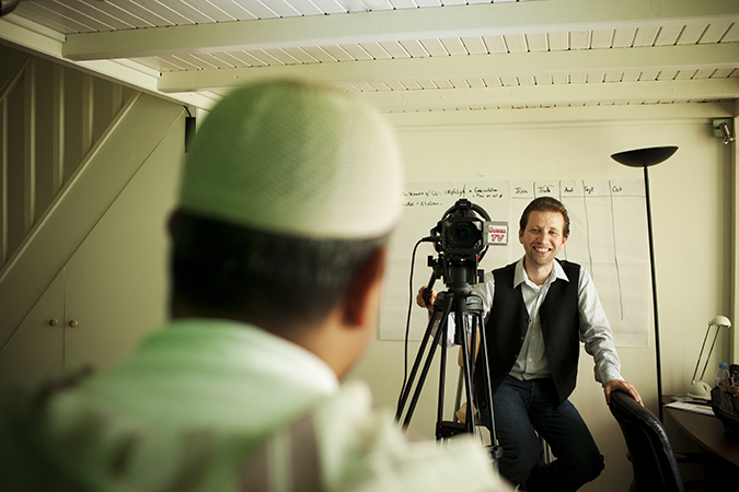 A man preparing a video shoot