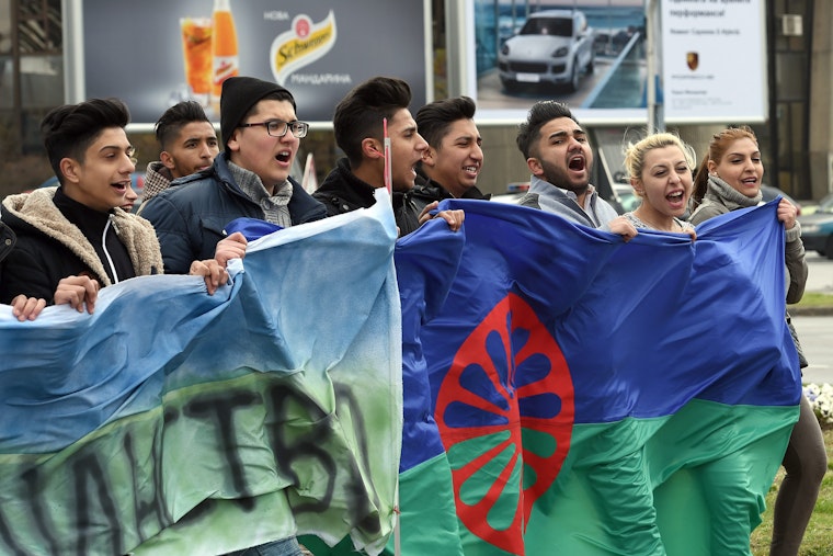 Members of the Roma organization Romano Avazi celebrate International Roma Day in Macedonia on April 8, 2015. Photo credit: © Georgi Licovski/EPA/Newscom Demonstrators holding banners in a march